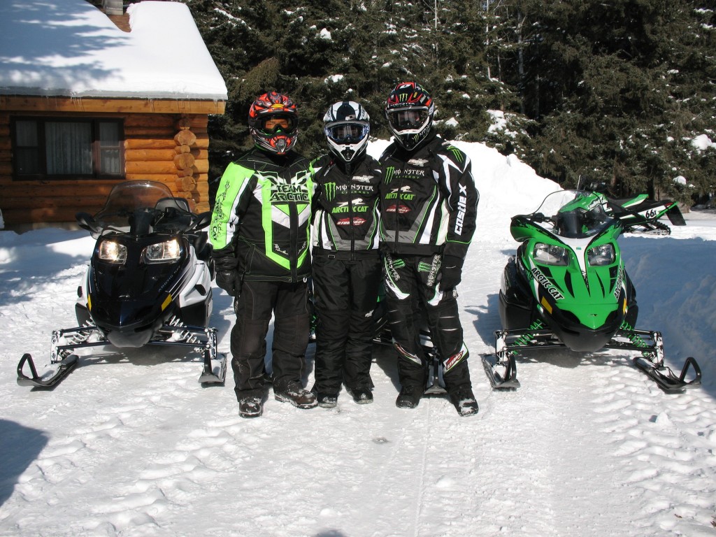 Roger, Mandi and Tucker Snowmobiling at Skime Ranch 2.14.10